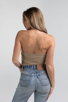 Details Crystal is the tube top your closet has been missing. Double lined on the front and she does not slip. Featuring a hold-you-in fabric and sits at the natural waistline. Made in LA Pre-washed Tube Top, Crystals, Fabric