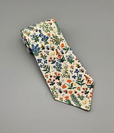 Elegant Cotton Ties For Spring, White Neckwear For Spring Formal Occasions, White Formal Neckwear For Spring, Spring Formal White Neckwear, Multicolor Summer Ties For Formal Occasions, Cotton Standard Tie For Summer, White Ties Neckwear For Spring, White Neckwear With Ties For Spring, Summer Formal Ties With Floral Print