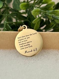 A beautiful 16K gold plated necklace engraved with "And what does the Lord require of you but love kindness and to walk humbly with your God Micah 6:8 " Bible Verse Gold Necklace, Christian Jewelry Gifts, Scripture Personalized engraved Necklace Charms are gold plated over stainless steel. Plated jewelry is a wonderful, affordable way to add a sophisticated look to your wardrobe, with the look of real gold. It is also an excellent choice for people with sensitive skin. CARE TIPS: Avoid contact w Inspirational Gold Charm Necklaces For Anniversary, Gold Spiritual Jewelry With Engraved Text, Inspirational Gold Necklace For Personalized Gift, Inspirational Gold Charm Necklaces For Mother's Day, Inspirational Gold Charm Necklace For Mother's Day, Gold Necklace With Engraved Text, Meaningful Engraved Gold Jewelry, Gold Jewelry With Engraved Text For Memorial, Gold Memorial Jewelry With Engraved Text