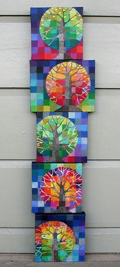 three pieces of art made out of different colored papers and paper plates with trees on them