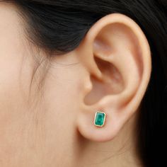 Product Details Enhance your cocktail party style with our stunning Solitaire Stud Earrings. Adorned with an Octagon Emerald, theyre perfect for formal attire. Shop now! Product Information SKU SHP-EARRINGS0621106457 Length 6.6 mm Width 4.6 mm Weight 0.96 gm (Approximate) EMERALD INFORMATION No.of Stones 2 Pieces Total Weight 1.32 Carat (Approximate) Dimension(approx) Emerald Cut-4X6 mm-2 Pcs Color Green Cut Brilliant Shape Emerald Cut Setting Type Bezel-Setting Quality Grade AAA View More Produ Cocktail Party Fashion, Cleaning Stone, Solitaire Studs, Signature Jewelry, Party Style, Timeless Jewelry, Emerald Gemstone, Formal Attire, Conflict Free Diamonds