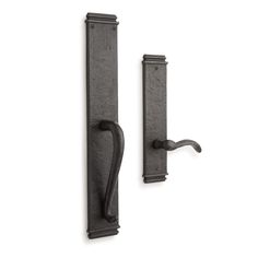 an iron door handle with a black finish on the front and back of it, against a white background