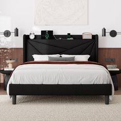 a bed with white sheets and black headboard in a modern style bedroom, designed to look like an art deco piece