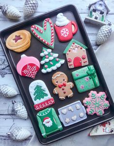 decorated christmas cookies on a baking tray