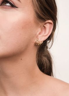 LET YOUR LIGHT SHINE BRIGHT WHAT IT IS: A gold plated earring whose unique design tucks perfectly underneath your ear to hug your lobe WHY IT’S SPECIAL: Tired of boring earrings? Here's a design that makes a subtle statement, while being comfortable to wear all day. Inspired by the idea that every woman has a light inside of her, it embodies this mission by perfectly reflecting light across your ear GOOD TO KNOW: 14k Gold Plated WHY WE LOVE NINA BERENATO: There’s nothing we don’t love about Nina Skull Jewelry Women, Texas Jewelry, Buy Earrings Online, Tiffany And Co Necklace, Buy Earrings, Buy Necklace, Let Your Light Shine, White Gold Necklaces, The Ear