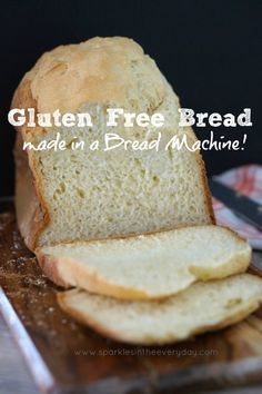 a loaf of gluten free bread is on a cutting board with a knife