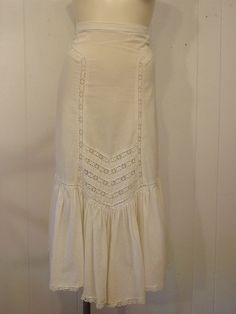 "Vintage 1970s women's hippy bohemian outfit. Halter top and matching skirt. Made of off white cotton. Laced top will adjust for size. About a size small. Made by Cherry Frizzel. Skirt has a back zipper. Actual measurements are: waist: 21.5\" hips: 39\" length: 36\" In very good condition." Hippy Skirt, Bohemian Outfit, 1970s Women, Vintage Bathing Suits, Hippie Skirts, Vintage Swimsuit, 1970s Dresses, Skirt And Top, Antique Dress