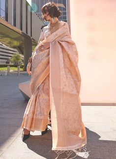 Introducing our exclusive Beige Zari Handloom Weaving Saree! Perfect for wedding parties and traditional wear, this Indian sari features a beautiful rich pallu and comes with a matching blouse. Elevate your style with the intricate weaving and timeless charm of this saree. The unstitched blouse can be customized upto 44 inches. Do Note: All the accessories shown are for styling purpose only. Slight color variation may occur due to photographic reasons. Fall and Pico : Done Drapping Saree(Ready t Wedding Pre-draped Saree With Zari Weaving, Katan Silk Pre-draped Saree For Wedding And Diwali, Floor-length Tussar Silk Traditional Wear For Wedding, Wedding Tussar Silk Pre-draped Saree For Festivals, Tussar Silk Traditional Wedding Wear Floor-length, Festive Traditional Drape Wedding Saree, Floor-length Raw Silk Saree With Unstitched Blouse, Traditional Gold Floor-length Blouse Piece, Traditional Floor-length Gold Blouse Piece