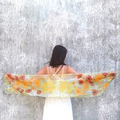 Beige silk scarf, hand painted with wild flowers and herbs. This lightweight scarves will be painted for you in 3 days! Size: 61 by 11 inches (155 by 28 centimeters) Silk: pure Habotai Light, semi transparent and a bit glossy. This scarf is perfect for summer as it is light and translucent. This orange and gold silk scarf is entangled with wild flowers: poppies, goldenrod and peonies. It shines and vibrates with positivity, filled with sun and warmth! The meadow scarf can be hand washed (I am at Yellow Silk Scarf, Flowers Poppies, Orange Poppies, Wild Herbs, Skull Scarf, Beautiful Sketches, Yellow Scarf, Beige Silk, Flower Scarf