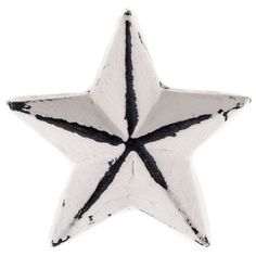 a white and black star ornament on a white background