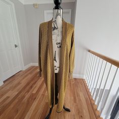 Womens Long Cardigan In Marigold/Mustard With Burgundy Trim. Never Worn Without Tags. Perfect Layering Piece. Size M Fitted Gold Cardigan For Fall, Yellow Long Cardigan For Fall, Gold Long Sleeve Cardigan For Spring, Long Sleeve Gold Cardigan For Spring, Long Yellow Fall Cardigan, Mustard Long Sleeve Winter Cardigan, Yellow Knit Cardigan For Layering, Mustard Long Sleeve Cardigan For Winter, Yellow Cardigan For Fall Layering