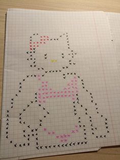 a cross - stitch pattern with a cat on it's back and pink dots in the middle