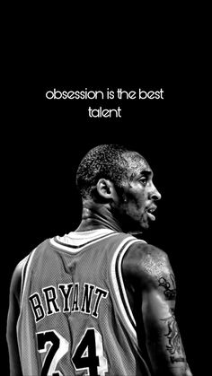 an image of a basketball player in black and white with the caption's name above it