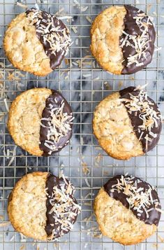 cookies with chocolate frosting and sprinkles on a cooling rack