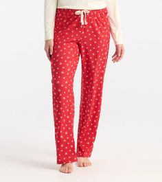 Slip into effortless comfort with the Capelton Road Red Snowflakes Pajama Pants. Designed with a soft blend of polyester and spandex, these pants offer a smooth, flexible fit for all-night comfort. 95% Polyester, 5% Spandex Straight leg pant with relaxed fit Waistband with elastic encased Functional twill tape drawcord Single patch pocket at wearer's left front hip Packaged in a matching drawstring bag for easy gifting Machine washable Snowflake Pajama Pants, Red Snowflakes, Bookmarks Kids, Straight Leg Pant, Wedge Flip Flops, Winter Nights, Pj Pants, Snowflake Pattern, Twill Tape