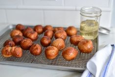 there are some doughnuts that have been placed on a cooling rack