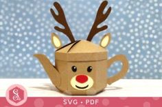 a paper cup with reindeer's head on it and the words svg - df