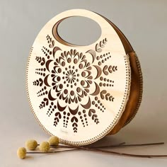 a wooden bag sitting on top of a white table