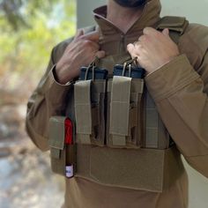 The LA Police Gear Double Kangaroo Magazine Pouch is an essential addition for those who need to carry extra M4 and pistol magazines but are low on space.  Available now at lapg.com! #tactical #gear #tacticalgear #lapg #lapolicegear Magazine Pouches, Kangaroo, Magazine, Pouch