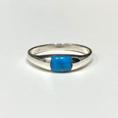 Vintage Sterling Silver Turquoise Ring ...Marked 925...Total of weights 6.6gramsMeasure of Face 4.5MM...It's in very good condition. Turquoise Rings With Polished Finish, Classic Turquoise Ring Stamped 925, Classic Blue Turquoise Ring In Sterling Silver, Classic Blue Turquoise Ring Stamped 925, Classic Blue Turquoise Sterling Silver Ring, Blue Turquoise Ring Stamped 925 For Promise, Blue Turquoise Ring With Polished Finish In Sterling Silver, Blue Turquoise Ring With Stamped 925 For Promise, Silver Turquoise Ring