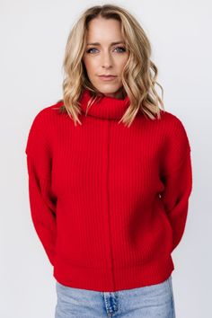 Baltic Born exclusive style Vibrant Red color Knit material with stretch Cozy turtleneck style Relaxed pull over style Raised knit details on bodice and shoulder Dropped shoulder Ribbed sleeves and hem 57% Polyester, 26% Acrylic, 14% Nylon, 3% Spandex Trina is 5'6, cup size 32D, size 2 and is wearing size S High Neck Knit Sweater With Ribbed Neckline, Knit Sweater With Ribbed High Neckline, Fall Knit Mock Neck Turtleneck Top, Knit Turtleneck Mock Neck Top For Fall, Winter Knit Turtleneck With Ribbed Neckline, Chic Knit Mock Neck Top For Fall, Winter Knit Mock Neck Top, Winter Knit High Neck Mock Neck Top, Winter High Neck Knit Mock Neck Top