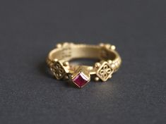 Byzantine Gemstone Jewelry For Weddings, Medieval Style Wedding Ring Jewelry, Ceremonial Heirloom Ruby Ring With Intricate Design, Traditional Ceremonial Ruby Rings, Medieval Style Wedding Jewelry, Ornate Gold Ruby Ring, Traditional Ruby Rings For Ceremonial Occasions, Ornate Ruby Ceremonial Jewelry, Medieval Style Anniversary Ring Jewelry