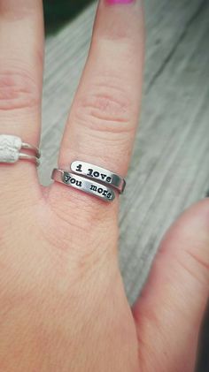 Check out this item in my Etsy shop https://www.etsy.com/listing/533343409/i-love-you-more-wrap-ring-hypoallergenic Adjustable Engraved Ring For Valentine's Day Promise, Adjustable Meaningful Rings As Gift, Meaningful Adjustable Rings As Gift, Meaningful Customizable Adjustable Rings, Inspirational Hand-stamped Rings For Gifts, Adjustable Rings With Custom Text For Gifts, Custom Text Adjustable Rings As Gifts, Custom Text Adjustable Rings For Gifts, Engraved Promise Ring For Mother's Day