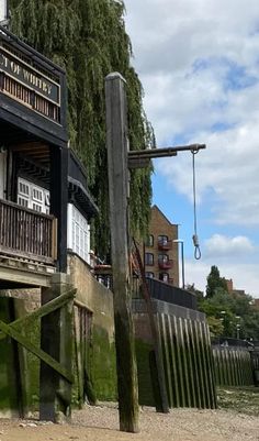 an old building with a wooden fence around it