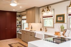 the kitchen is clean and ready for us to use in its new owner's home