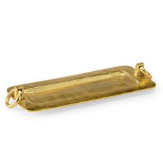 a gold tray with two handles and a chain around the edge, on a white background