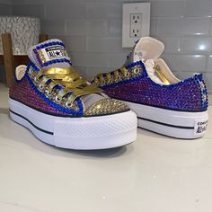 Custom Converse Designed In Gold, Royal Purple And Blue Rhinestones! Shoe Is Topped Off With Golden Laces! Converse Design, Golden Lace, Custom Converse, Bling Shoes, Royal Purple, Blue Rhinestones, Womens Converse, Converse Shoes, Chuck Taylor