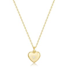 a gold heart necklace with a diamond in the center Heart Shaped Gold Sterling Silver Diamond Necklace, Classic Gold Diamond Necklace With Heart Charm, Dainty Gold Heart Diamond Necklace, Dainty Heart-shaped Gold Diamond Necklace, Gold Heart Pendant Birthstone Necklace In Sterling Silver, Gold Sterling Silver Heart Pendant Birthstone Necklace, Gold Heart-shaped 14k Gold Birthstone Necklace, Heart Locket Necklace, Gold Locket