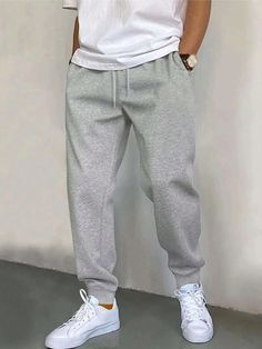 Light Grey  Collar  Fabric Plain Jogger Embellished Slight Stretch Fall/Winter Men Clothing Cotton Joggers Men, Boys Sweat Pants, Nike Grey Sweatpants Outfit Men, Mens Clothing Styles Winter Outfit, Grey Joggers Men Outfit, Mens Outfits Sweatpants, Man In Sweatpants, Men In Grey Sweats, Men’s Joggers