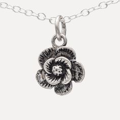 "Uncover the sublime elegance of our 925 Sterling Silver Rose Flower Pendant Necklace. The necklace features a meticulously crafted pendant with a design inspired by the timeless beauty of a blooming rose. Measuring 0.39\"x0.39\" (10x10mm), this small but impactful pendant exudes understated luxury, promising to bring a touch of sophistication to any outfit. Its fine detailing and high-quality material reflect our commitment to craftsmanship, ensuring that you get a jewelry piece that is both du Classic Flower Necklaces For Gifts, Classic Flower Necklaces For Gift, Classic Silver Jewelry With Flower Charm, Dainty Rose Design Flower-shaped Necklace, Rose Flower Charm Necklace, Delicate Silver Charm Necklace With Flower, Rose Flower Necklace With Flower Charm, Silver Charm Necklace With Flower Pendant, Elegant Rose Flower Charm Necklace