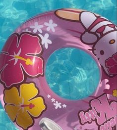 an inflatable swimming ring with flowers on it