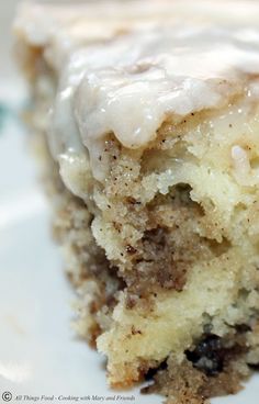 a close up of a piece of cake with icing on it's surface