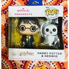 the two harry potter figurines are in their packaging