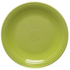 an empty green plate on a white background