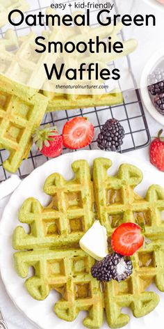 a plate with waffles and berries on it next to some other food items