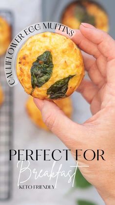 a hand holding a small pastry with leaves on it and the words perfect for breakfast