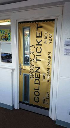 an open door with a yellow sign on it that says golden ticket, in front of a white wall