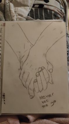 a drawing of two hands holding each other with the words never let me go written on it