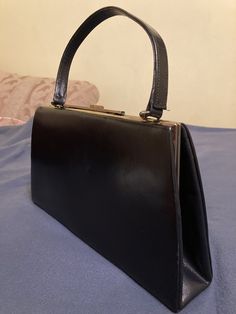 Welcome to my store Vintage Leather women's  Bag WINSLEY made in England The dimensions - height 18 cm (7.08 inches), length 32 cm (12.59 inches), width 6.5 cm (2.55 inches).  the handle on the bag was torn at the seams, so it is additionally sewn, there are traces of time on the bag, namely minor abrasions on the corners, as well as scratches If there is anything i need to clarify , feel  free to ask questions. I have other antique and vintage items for sale at the moment and shall be listing others over the following few days, so please keep checking my items for sale. If you are interested in the landmarks that are not currently available in my store, ask questions, maybe I will help you find it to replenish your collection. Dear Customers, you will receive exactly the same item which y Evening Satchel Bag With Detachable Strap, Elegant Single Handle Satchel Bag, Elegant Single Handle Office Bags, Leather Party Satchel, Elegant Tote Bag With Single Handle, Rectangular Evening Bag For Shopping, Retro Handheld Box Bag, Elegant Single Handle Bag For Daily Use, Elegant Single Handle Tote Bag