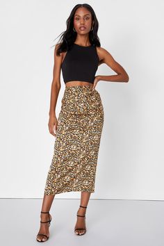 Every outfit is sure to become a little extra chic when you incorporate the Lulus Elevated Choice Black Floral Print Satin Midi Skirt! Sleek woven satin, with a darling floral print throughout, shapes this on-trend skirt that has a high waist and strategic side ruching, finishing at a cute midi hem. Kick pleat at back. Hidden zipper/clasp at side. Fit: This garment fits true to size. Length: Mid-calf length. Size small measures 35" from waist to hem. Waist: Fitted - elastic waist allows stretch. Fall Outfits For Women Over 50, Outfits For Women Over 50, Fall Outfits For Women, Classy Fall Outfits, Casual Formal Dresses, Midi Skirt Outfit, Lulu Fashion, Satin Midi Skirt, Black Floral Print