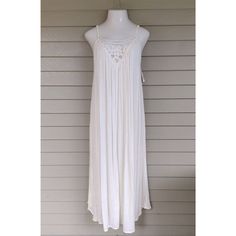 This Is Such A Lovely Maxi Dress By Billabong, Size Medium. It Is A White Flowy Gauzy Cotton With A Lovely Lace Design At The Top. It Has Spaghetti Straps For The Perfect Fit. It Is New With Tags And Says Sand Gypsy On The Label, Size M. It Measures 18" Across The Bust Laying Flat And So Will Fit Up To A 36" Bust Nicely. Measuring From Where The Dress Meets The Spaghetti Strap In Front, The Length Is 49". Flowy Sleeveless Maxi Dress For Daytime, Sleeveless Lace Trim Maxi Dress For Daywear, White Sleeveless Maxi Dress For Daytime, Bohemian Sleeveless Daytime Dress, Sleeveless Sundress With Lace Trim For Daytime, Bohemian Sleeveless Sundress For Daytime, Bohemian Sleeveless Maxi Dress For Daytime, Billabong Maxi Dress, Kiss Dress