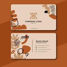 two business cards with an abstract design on the front and back, both in brown and white