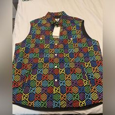 Gucci Authentic Multicolor Vest Size 48/ Mens Large/Xl. Purchased At Sample Sale. Tags Are Attached. Luxury Gucci Cotton Outerwear, Gucci Luxury Cotton Outerwear, Gucci Designer Cotton Outerwear, Designer Gucci Cotton Outerwear, Gucci Black Outerwear For Streetwear, Gucci Multicolor Outerwear For Fall, Gucci Multicolor Fall Outerwear, Gucci Jackets, Gucci Brand