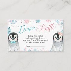 a ticket for a baby shower with penguins and snowflakes on the front, which reads diaper raffle