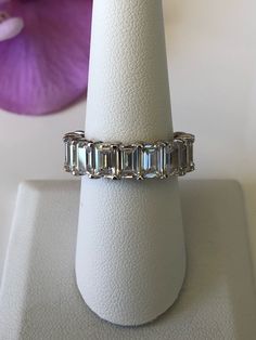 This eternity band is absolutely stunning! Crafted in Solid Sterling Silver 925 with High Grade 3A CZ Diamonds. Weight of each stone 0.75CT Even though the ring is thick and bulky, it is still comfortable. Will come in a box(one per package). Let us know if you have specific request please! * We accept returns and exchanges at buyer's shipping expense. Just contact me within: 3 days of delivery Ship items back to me within: 14 days of delivery *Please note that shipping fee is not refundable. Emerald Cut Cubic Zirconia Eternity Band With Prong Setting, Silver Moissanite Baguette Cut Eternity Band, White Gold Emerald-cut Stackable Eternity Band, White Gold Emerald Cut Stackable Eternity Band, Stackable Emerald-cut Cubic Zirconia Eternity Band, Stackable Emerald Cut Eternity Band For Anniversary, Stackable Emerald Cut Eternity Band For Promise Ring, Silver Emerald Cut Eternity Band Fine Jewelry, Diamond White Emerald Cut Eternity Band With Vvs Clarity