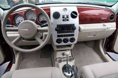 the interior of a car with beige leather seats